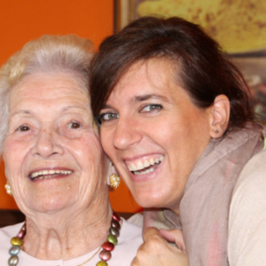 daughter and mother smiling for the camera